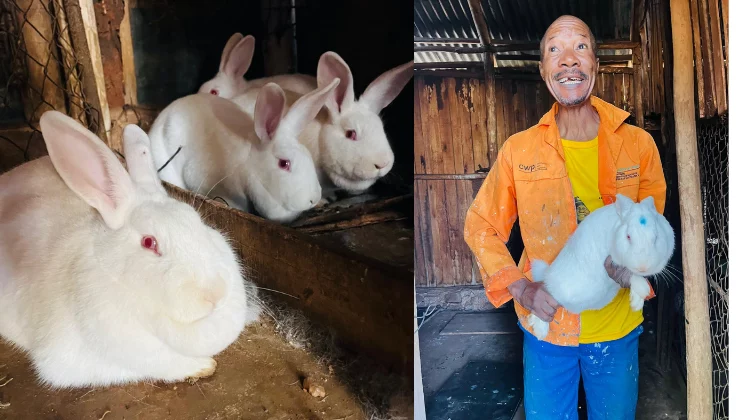 William Hleza with the rabbits he received from DARDLEA.